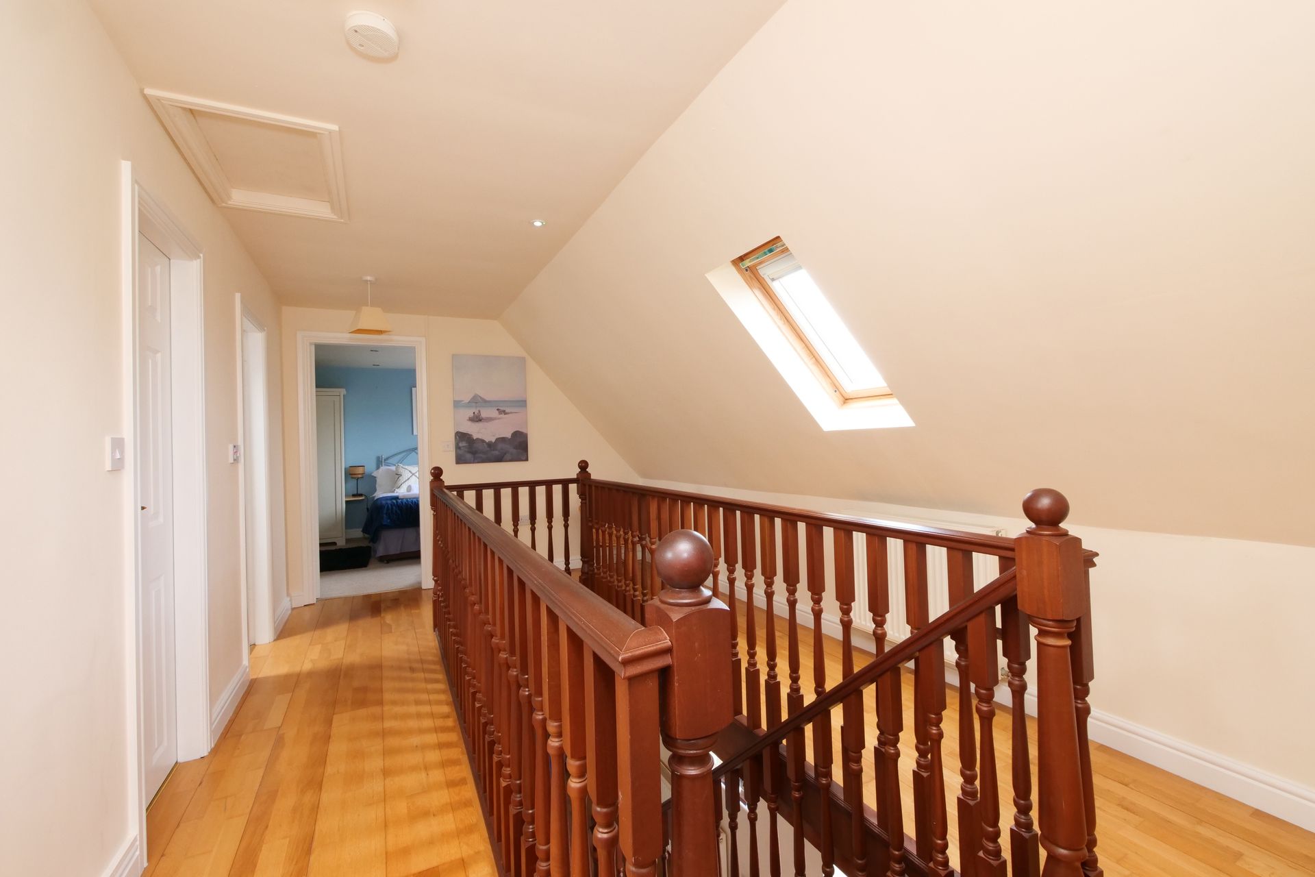 A wooden staircase leading up to the second floor of a house.