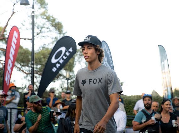 A man wearing an oakley hat and a fox shirt