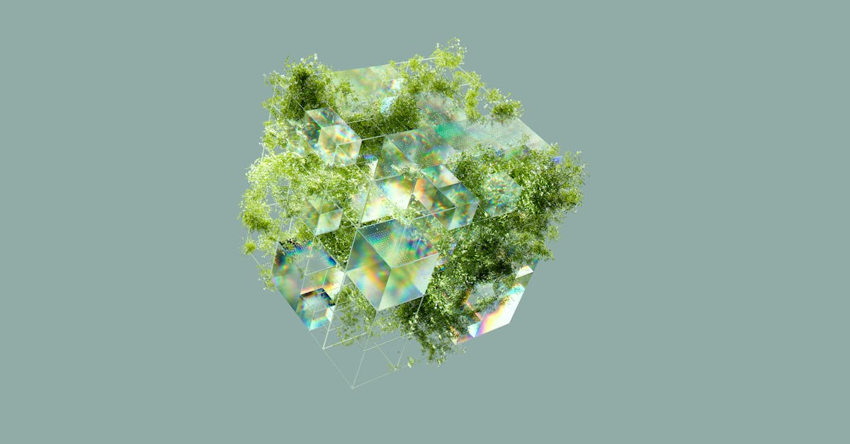 A sphere filled with green plants on a gray background.