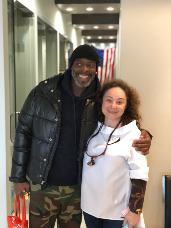 Arverne Dental patient smiling after dental checkup