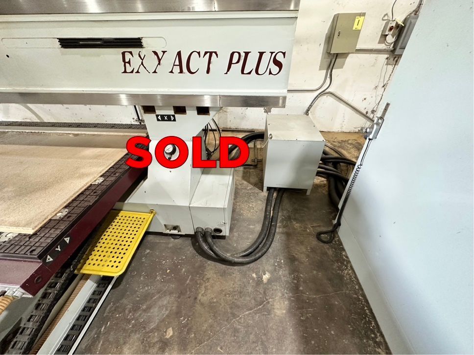 Close-up of a pre-owned CNC router table marked