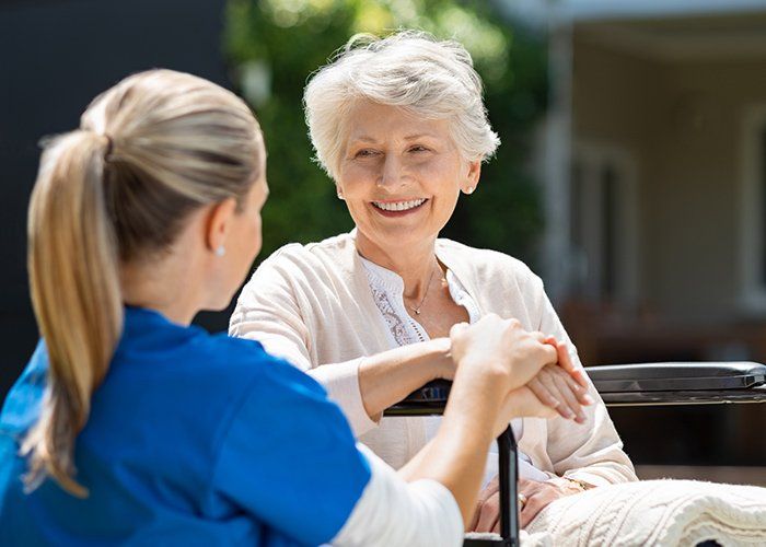 Elder Law Firm — Nurse Takes Care Of Old Patient In Rockville, MD