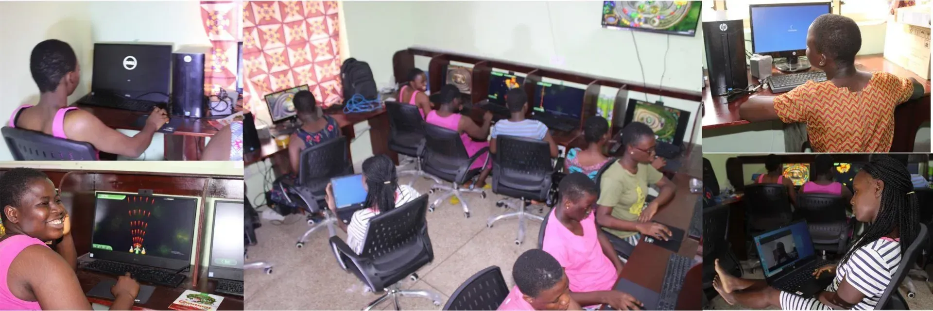 A group of people are working on computers in a room