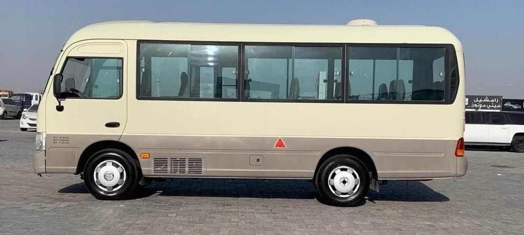 Red heart and hashtag on blue background, spelling GIVING TUESDAY