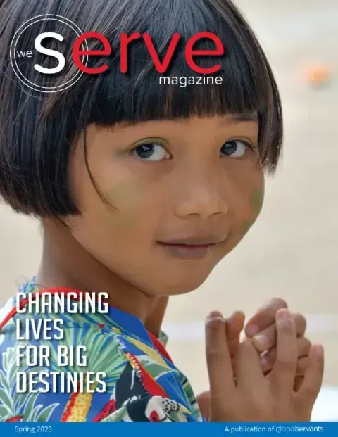 A young girl is on the cover of a magazine called serve