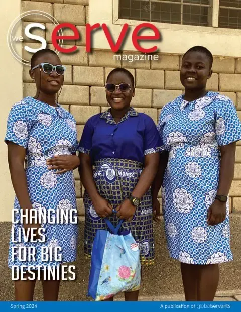 The cover of serve magazine shows three women in blue dresses