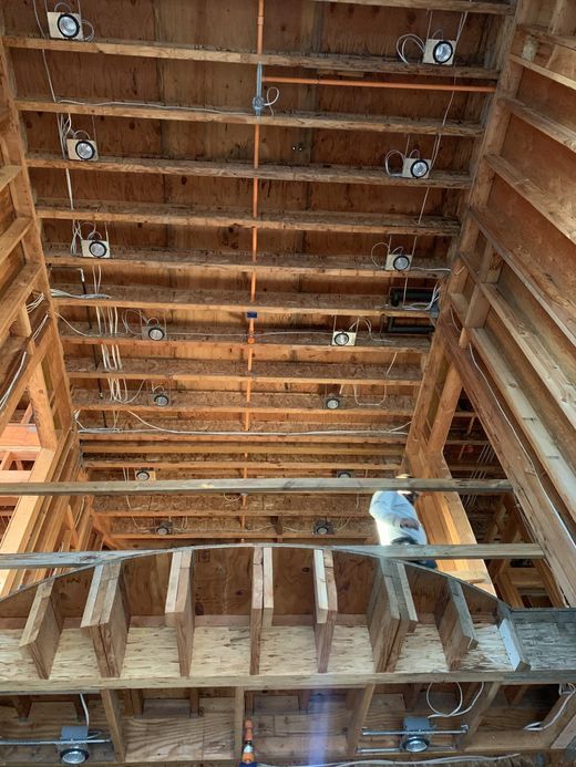 Looking up at the ceiling of a building under construction.