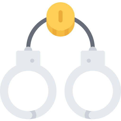 a pair of handcuffs with a coin attached to them .