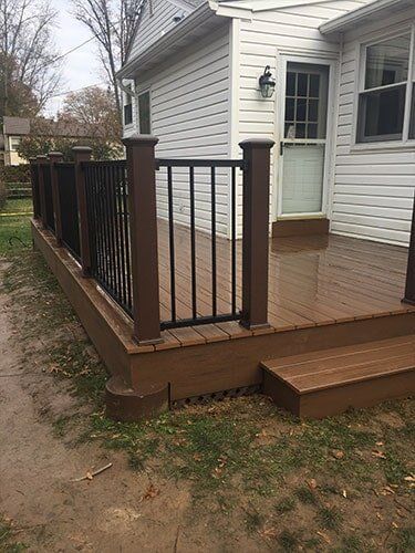 TimberTech Deck With A Trex Signiture Rail — Decking Services in Wyncote, PA