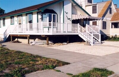 White House With White Decking - Decking Services in Wyncote, PA