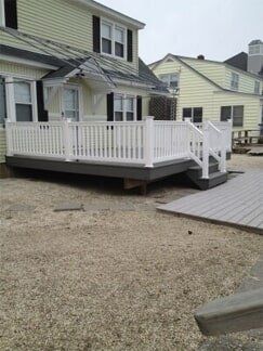 Side View Of The House With Newly Deck Terrace - Decking Services in Wyncote, PA