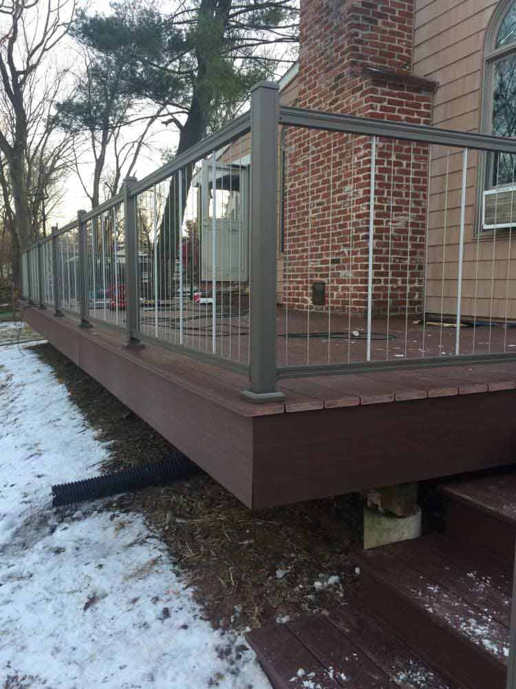 This Is An Azek Deck With Plugs Covering All Screws For A Smooth Deck Surface And An Aluminum Key Link - Decking Services in Wyncote, PA