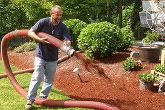 Male Blowing Barkdust — Top-Quality Hemlock & Red Fir Barkdust In Milwaukie, OR