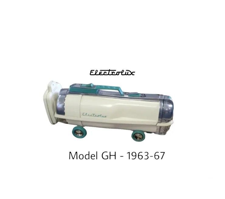 Vintage Electrolux vacuum cleaner, Model GH (1963-67), with a cream-colored body and teal handle on wheels.
