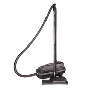 A dark gray canister vacuum cleaner standing upright with its hose and floor attachment connected.