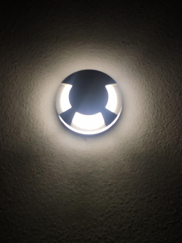 A Light That Looks Like an Eye is Lit Up in the Dark — AH Electrical in West Ballina, NSW