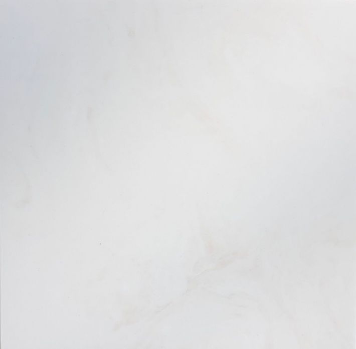 A textured beige surface featuring a subtle, light-colored mottled marble pattern.