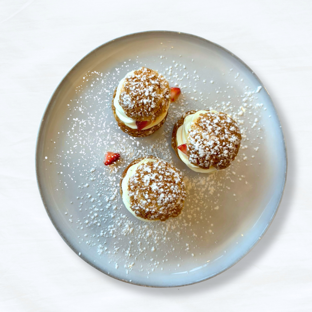 A place of Strawberry & Cream Profiteroles. 