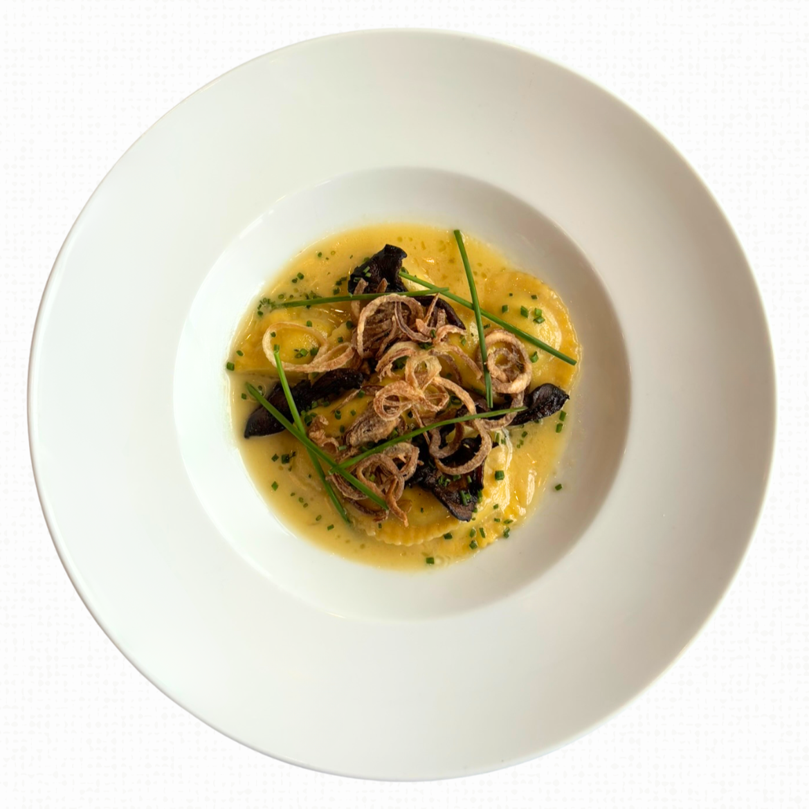 A plate of Mushroom Mezzaluna.  