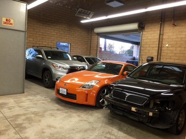 Pictures of Body Repair — Cadillac Body Repair before and after in Redlands, CA