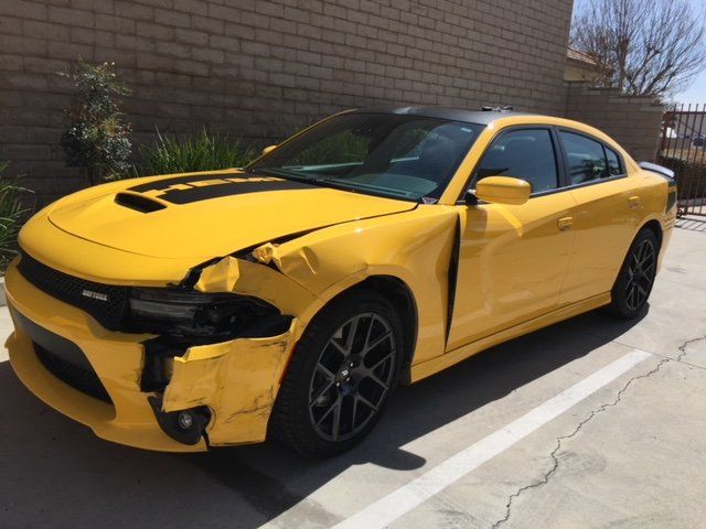 Auto Repair Pictures — Dents on Pick Up Trunk before and after in Redlands, CA