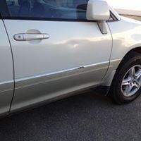 Body Restore — Dented Door before Restore in Redlands, CA  Image