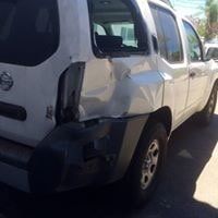 Body Restoration — Dented Rear Bumper in Redlands, CA