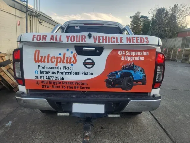 White And Orange Coloured Pick Up Truck — Autoplus Picton in Picton, NSW