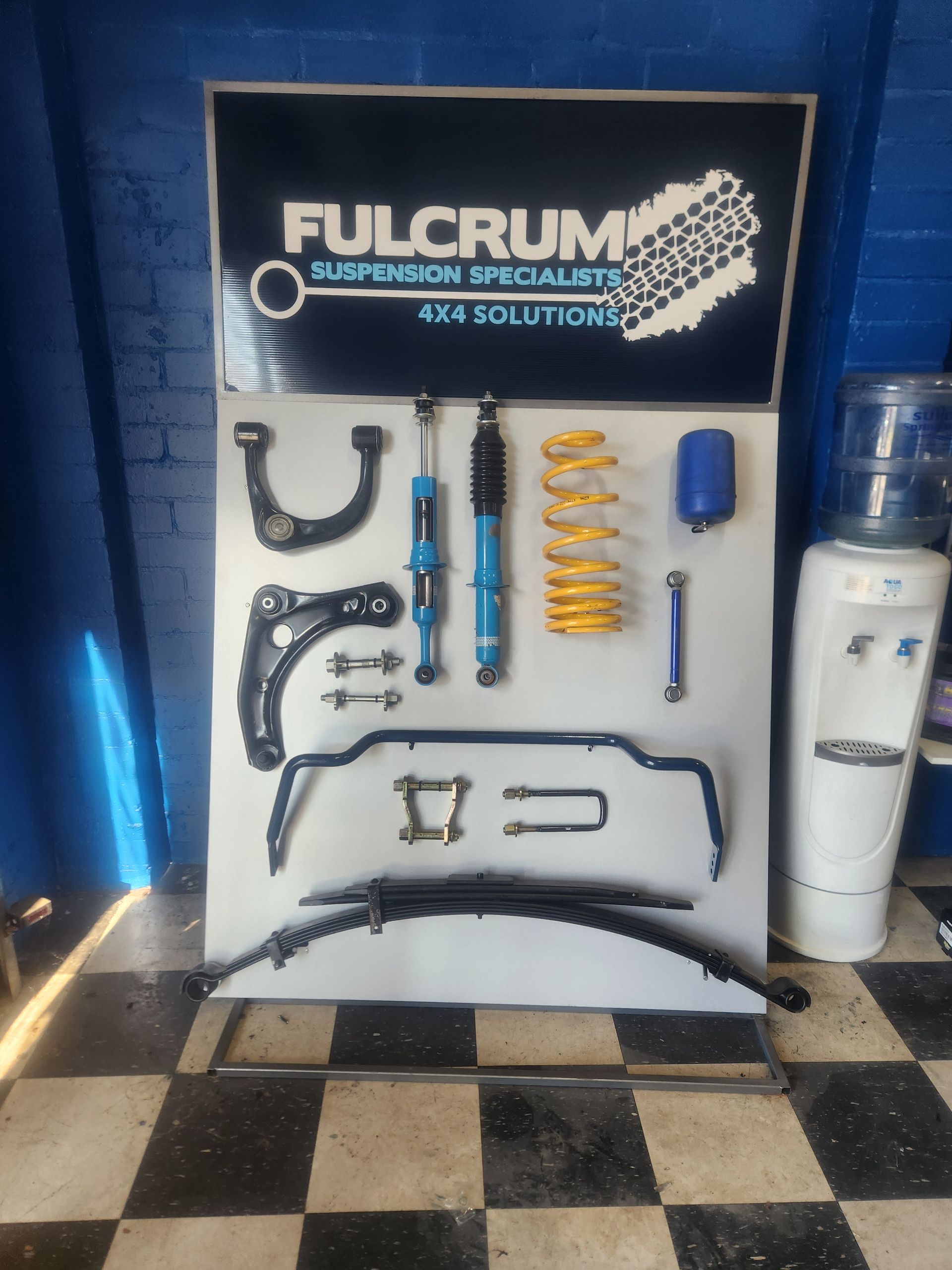 Fulcrum Suspension Parts Display: Blue and Yellow Shocks, Springs — Autoplus Picton in Picton, NSW