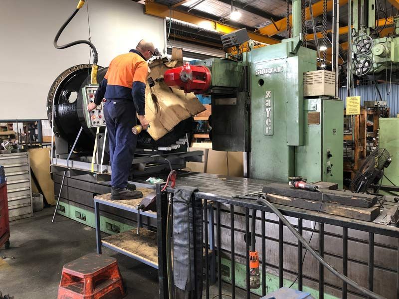 Checking the Machine — Brisbane, QLD — Mendham Engineering Pty Ltd