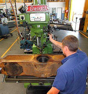 Man Working on the Factory — Brisbane, QLD — Mendham Engineering Pty Ltd