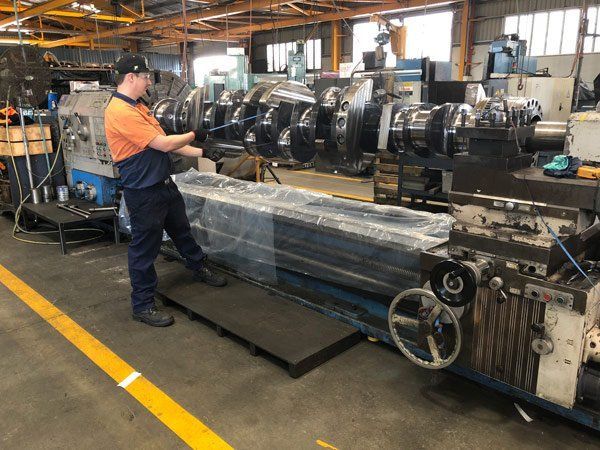 Staff Working on the Machine — Brisbane, QLD — Mendham Engineering Pty Ltd
