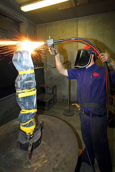 Cutting a Metal with a Torch — Brisbane, QLD — Mendham Engineering Pty Ltd