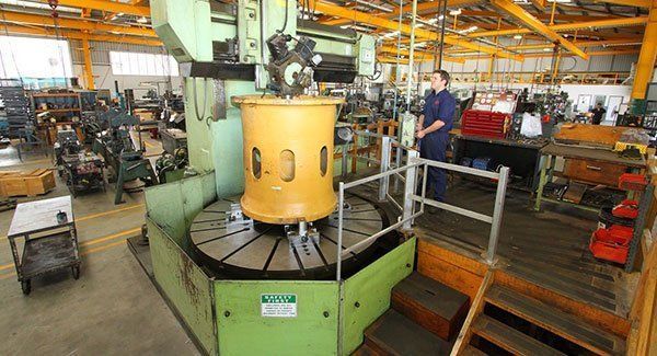 Man Looking on the Machine — Brisbane, QLD — Mendham Engineering Pty Ltd