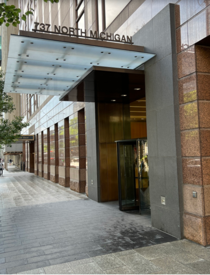 A building with 137 north michigan written on it