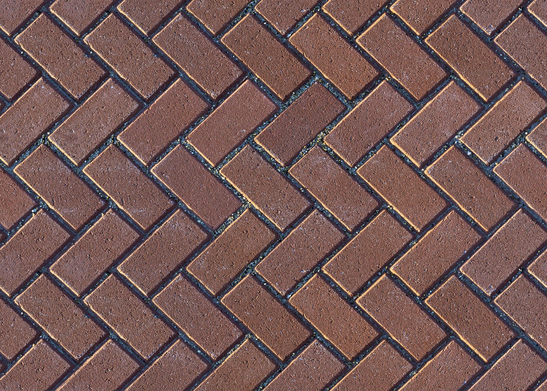 A brick paver (flooring) pattern that repeats seamlessly. 