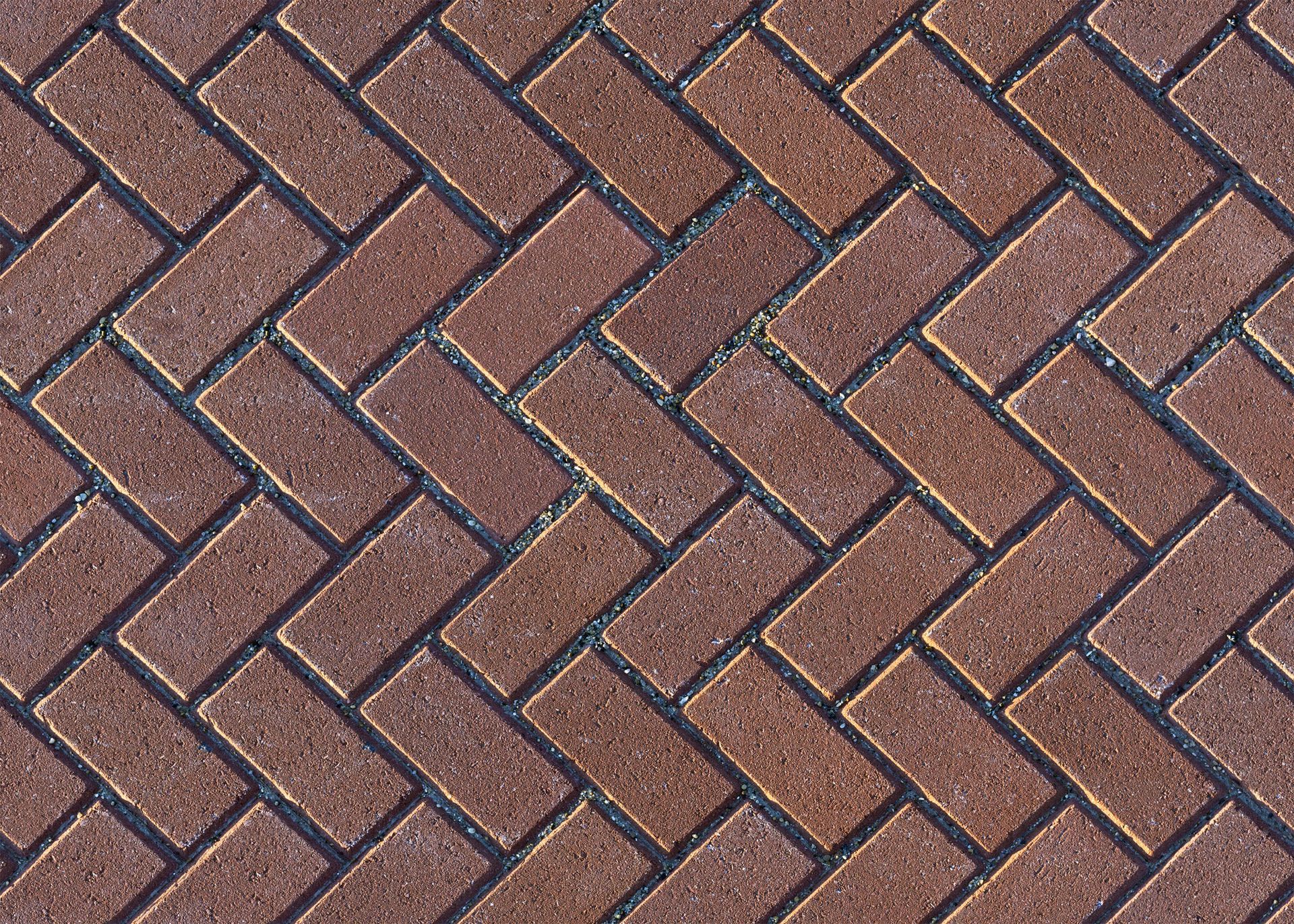 A brick paver (flooring) pattern that repeats seamlessly.