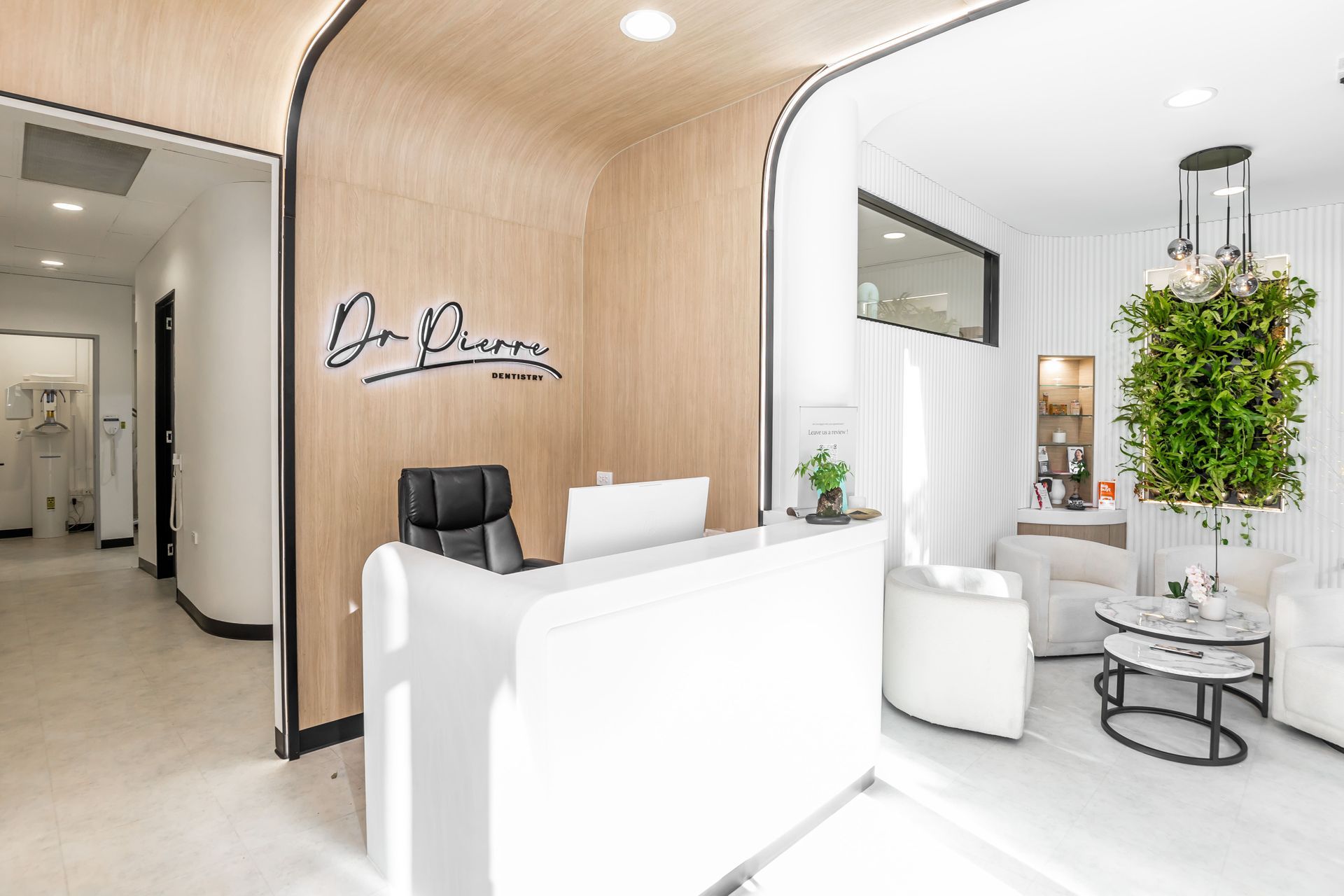 There is a reception desk in the middle of the room.