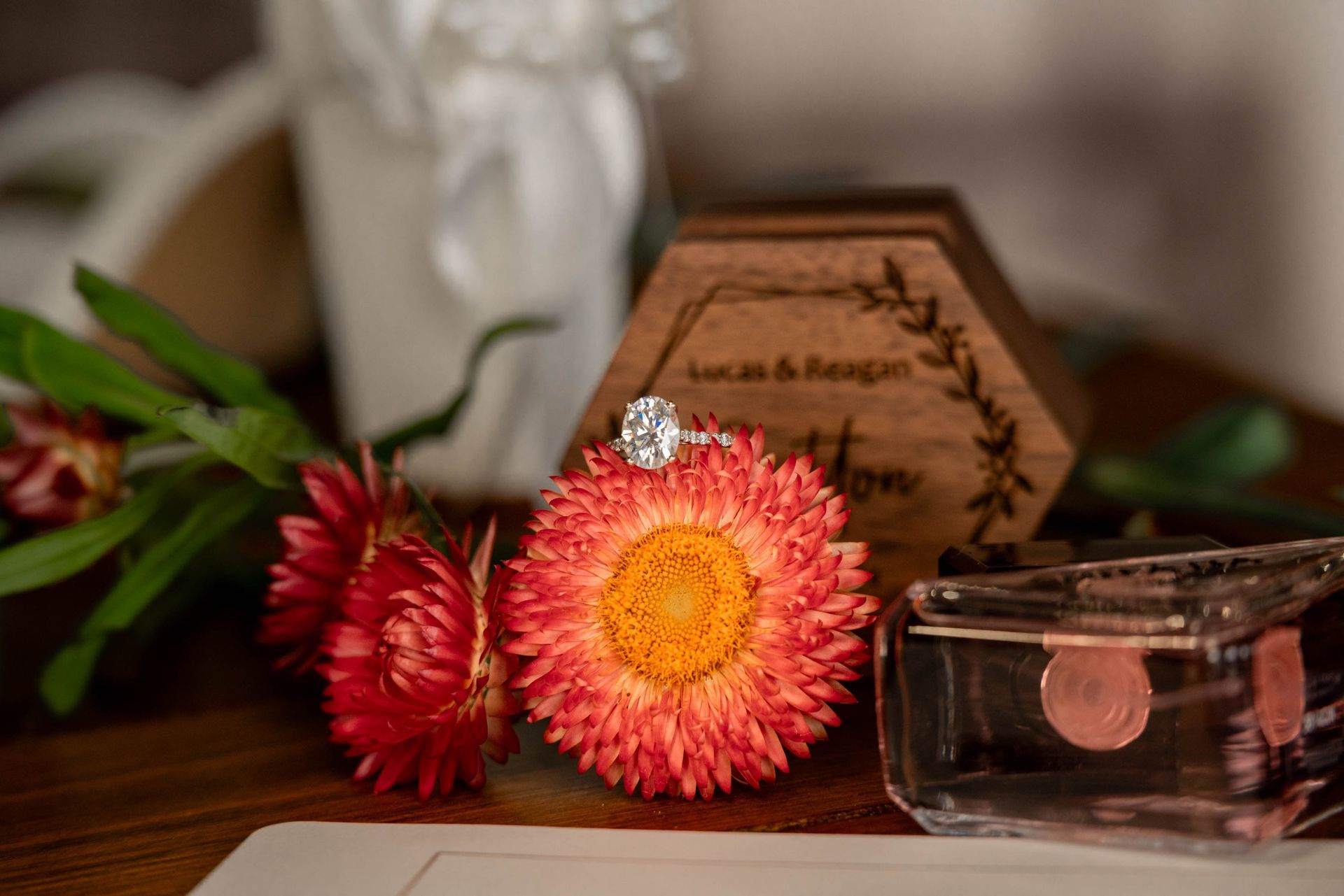 Detail image of wedding ring, flowers, and ring box at Ocoee Crest and photographed by a Chattanooga Wedding Photographer