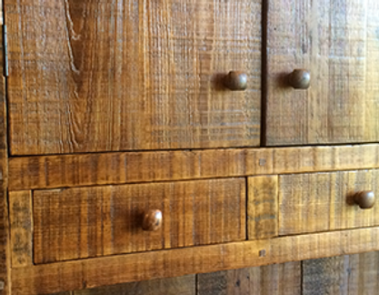 Wooden cabinet with two doors, two drawers, and small round knobs