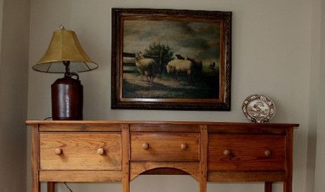 Wooden sideboard with lamp