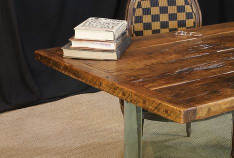 Wooden table with books, chair in background
