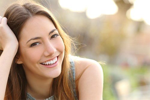 Dental Health — Smiling Girl With Healthy Teeth in Royal Oak, MI