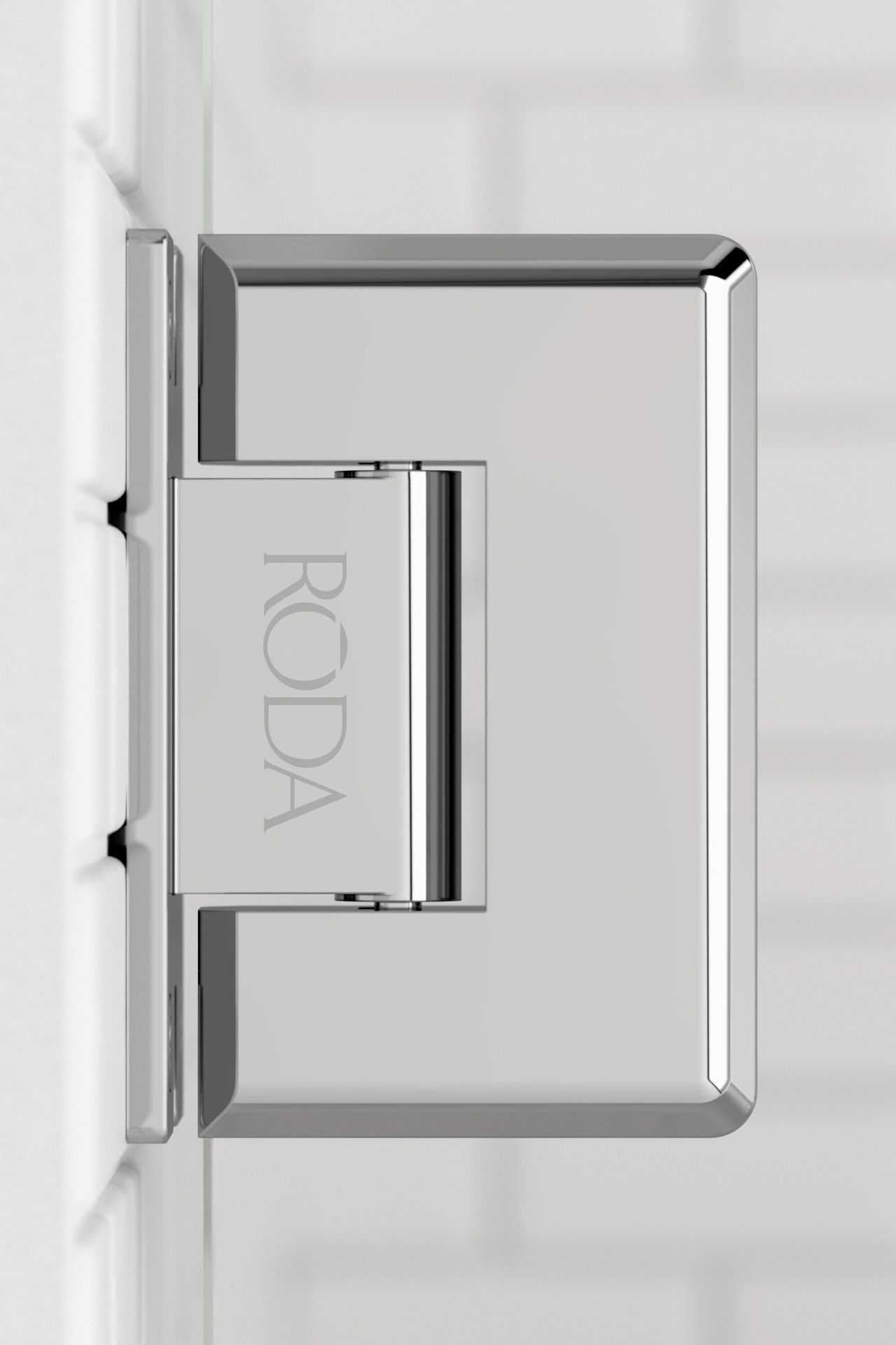 A close up of a chrome door hinge on a white wall.