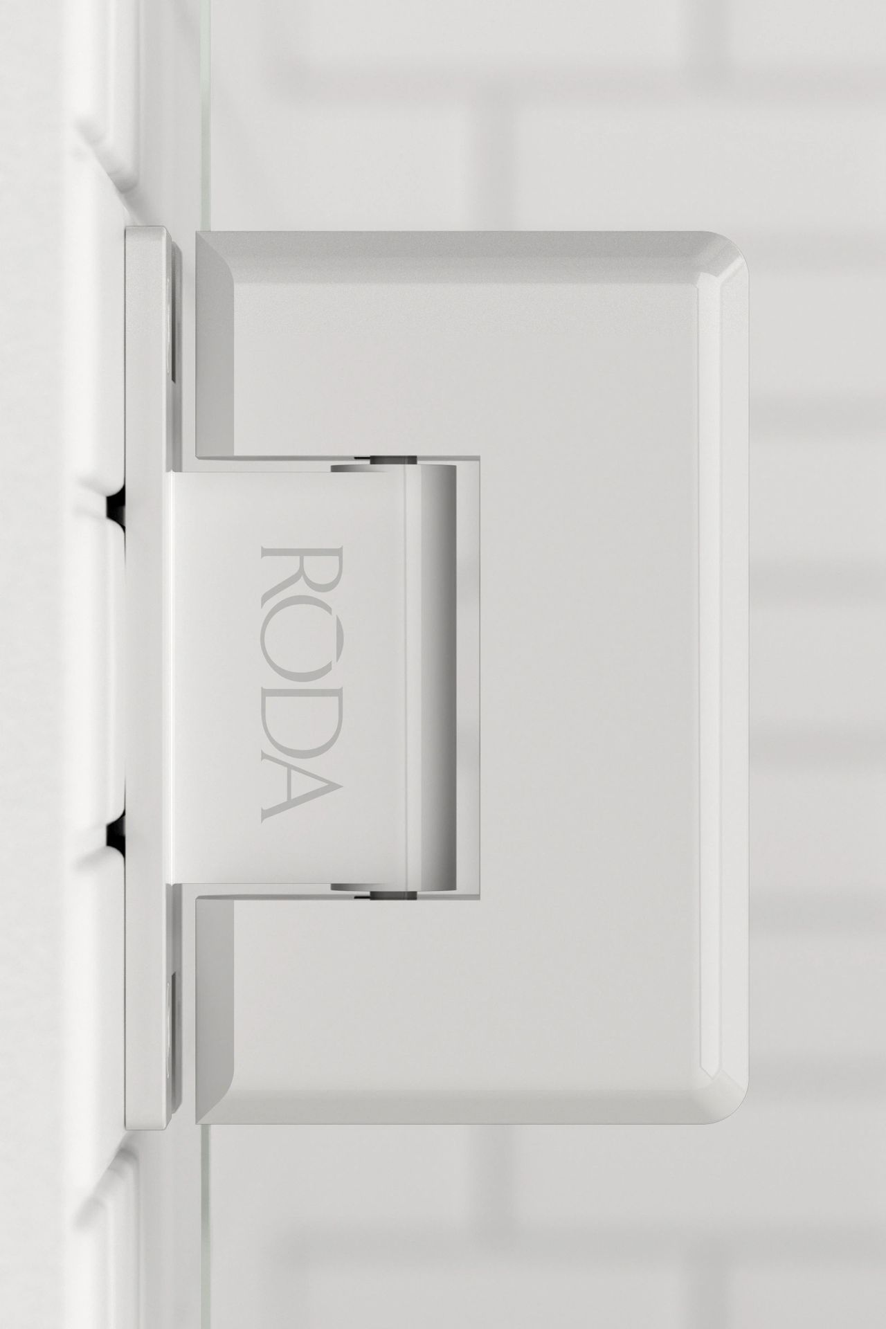 A close up of a white door hinge on a white wall.