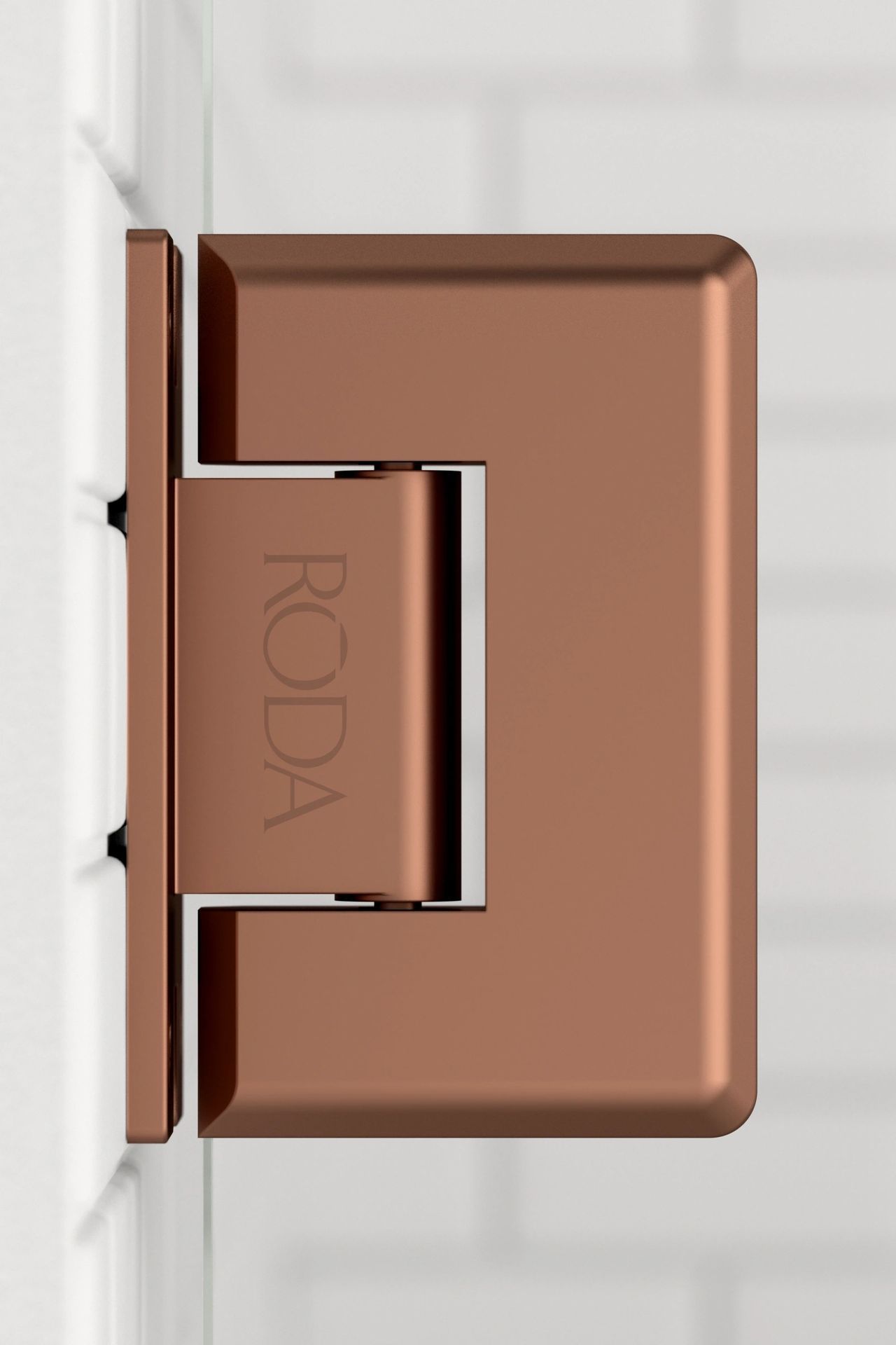 A close up of a roda door hinge on a white wall