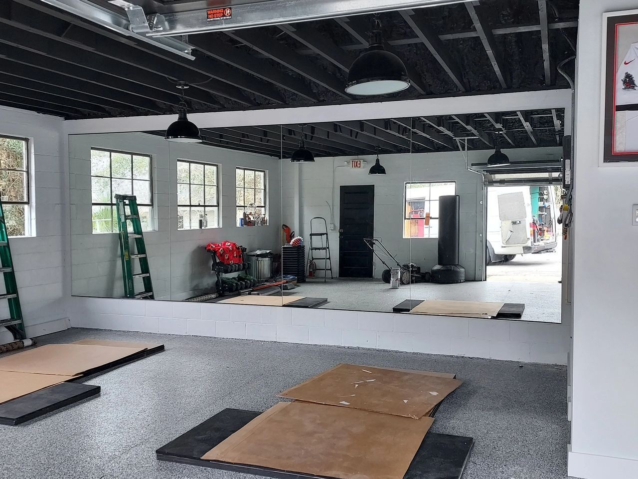 There is a large mirror in the middle of the room.