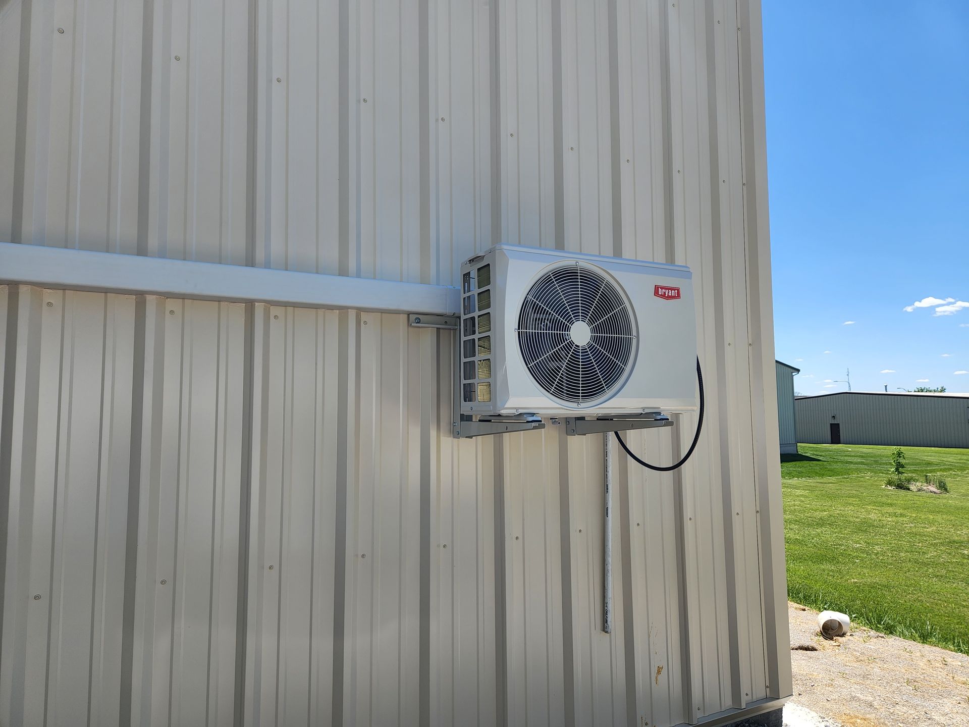 An lg air conditioner is mounted on the side of a building
