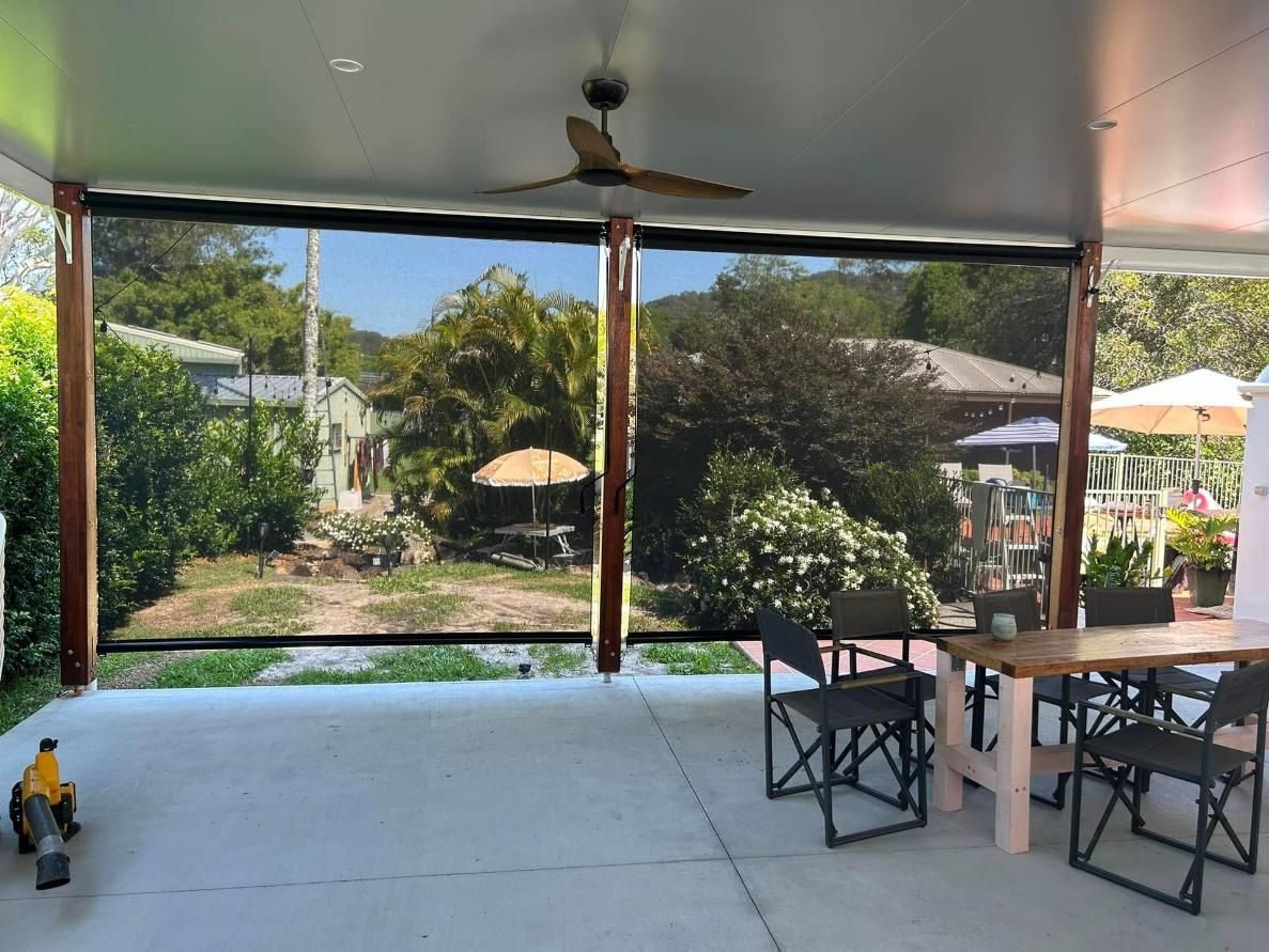 Patio With a Table and Chairs and a Ceiling Fan — Timeless Blinds And Shutters In Burleigh Heads, QLD