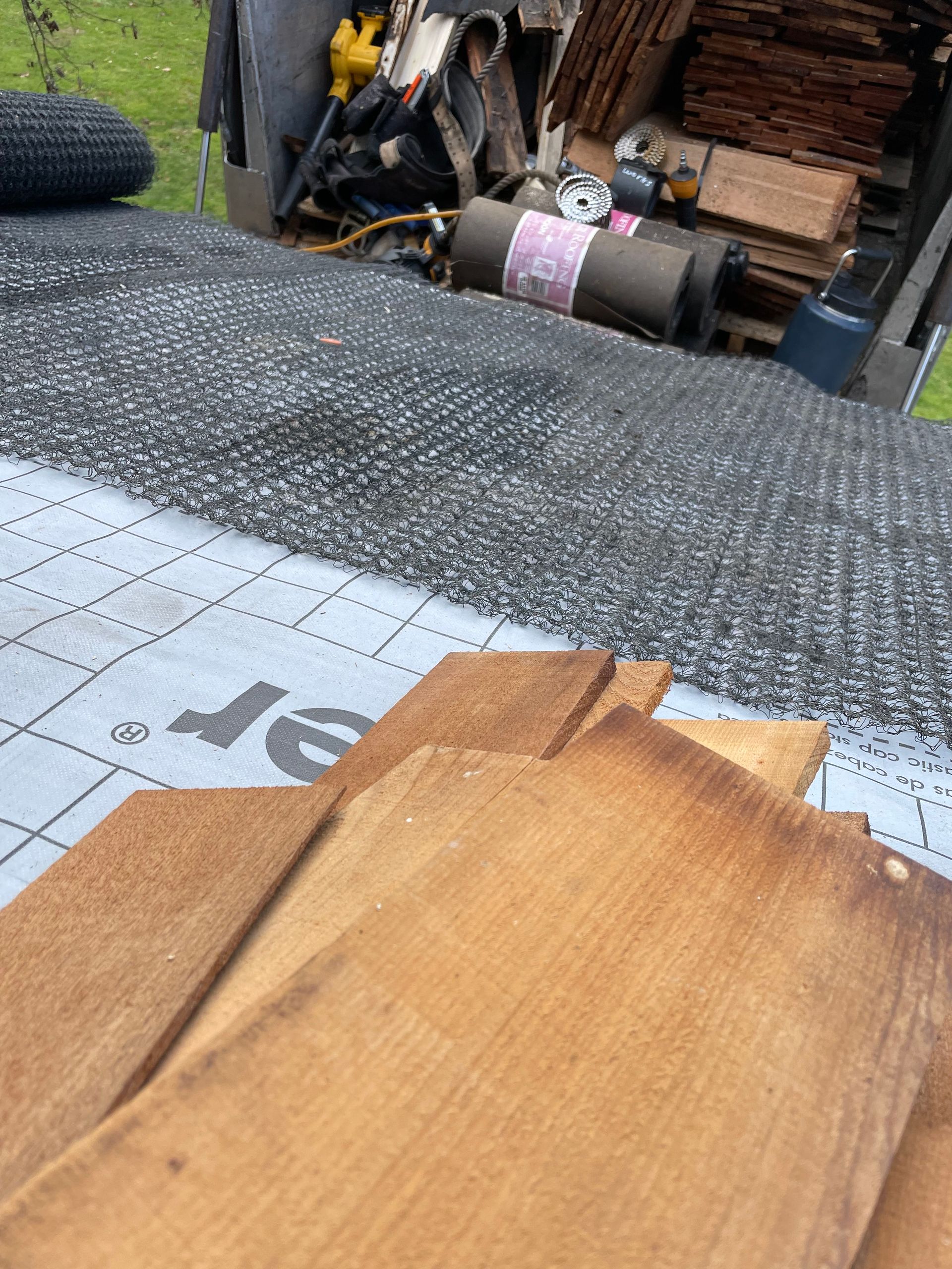 Comparison of wood shingle and gray slate roof textures.